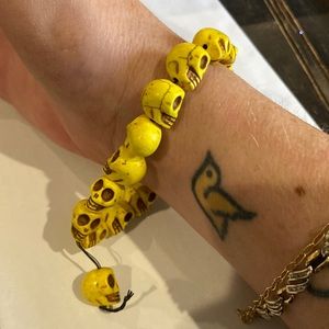 Yellow Hand Carved Bone Skull Stretch Bracelet